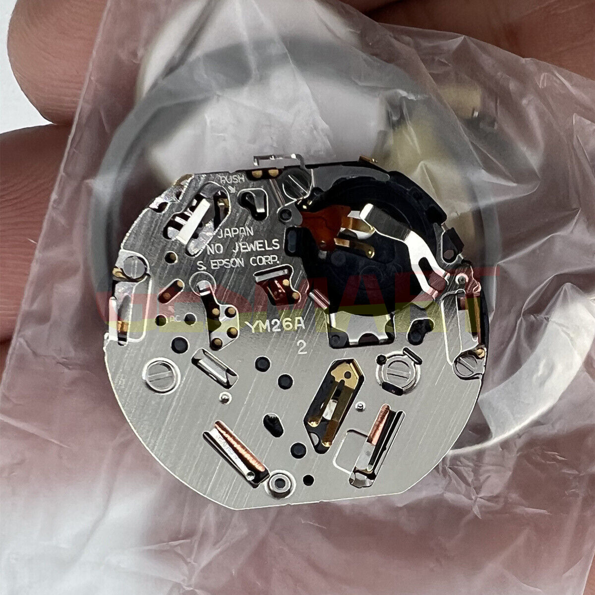 Hattori Epson TMI YM26A quartz watch movement, precision Japan-made component for repairs and upgrades.