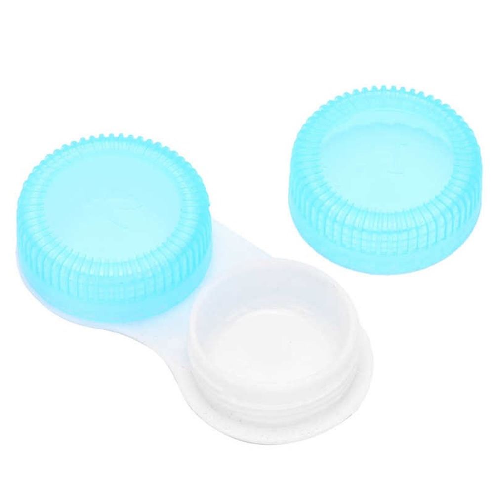Professional watch repair tool with luminous powder in blue, green, red, and yellow.