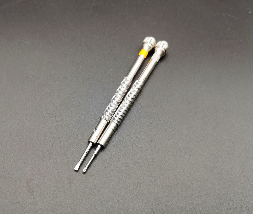 Set of 10 stainless steel watch screwdrivers for precise accessory repairs.