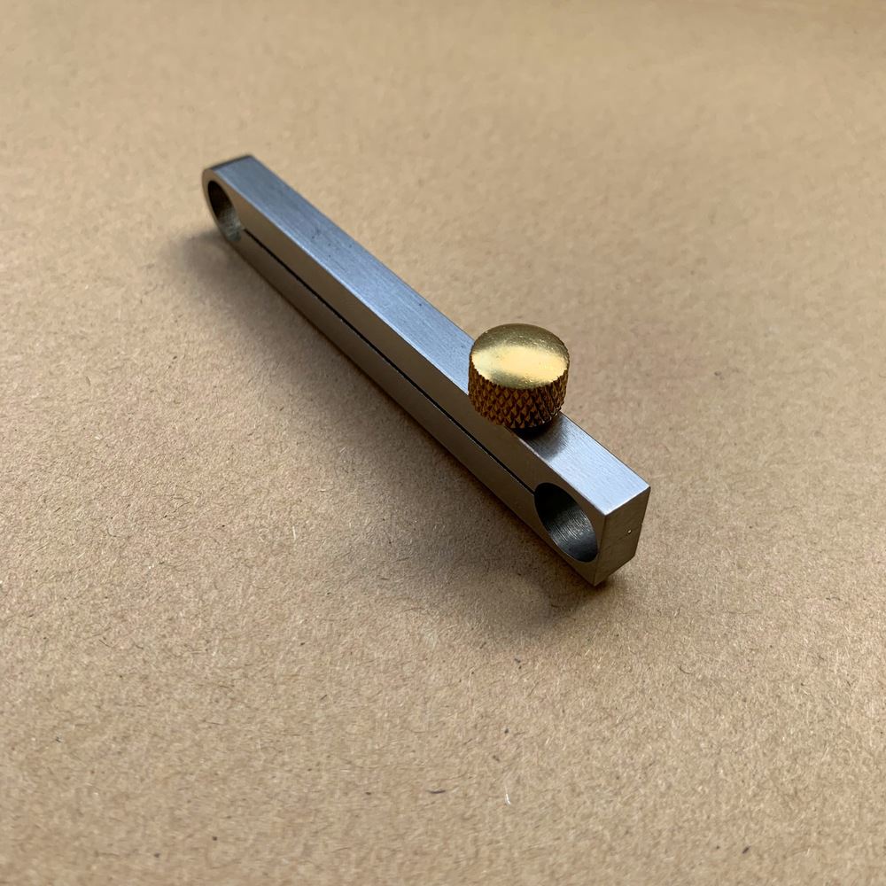 Metal manual watch center wheel remover tool, precise and durable for professional watch repairs.