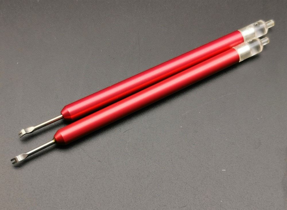 1. Rubber head needle punch tool set for precise watch hand setting.