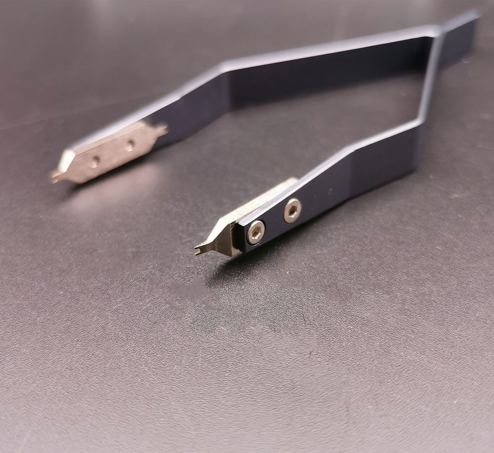 Precision stainless steel 7825 V type spring bar tweezers for delicate watch repair tasks