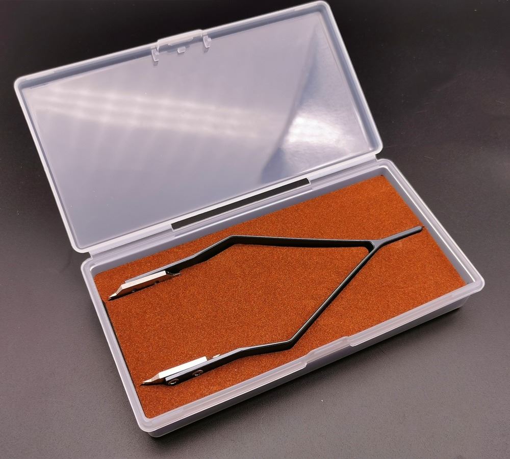 Precision stainless steel 7825 V type spring bar tweezers for precise watch repair tasks.