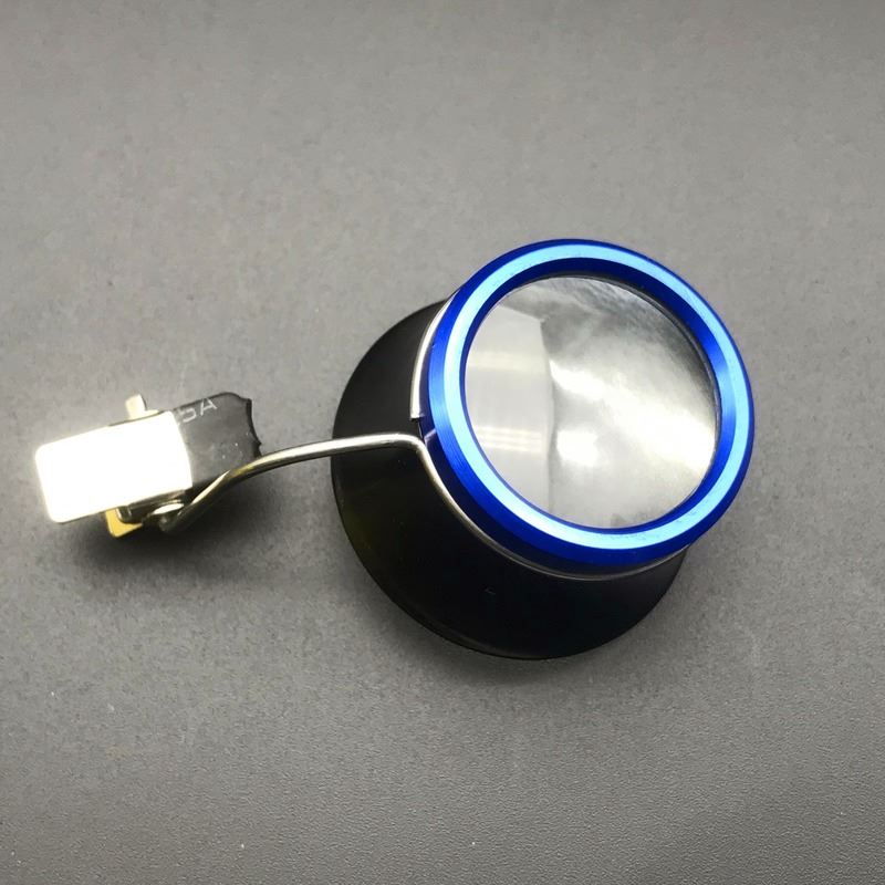 Set of ten  clip-on eyeglass magnifier loupes for precise watch and jewelry repairs.