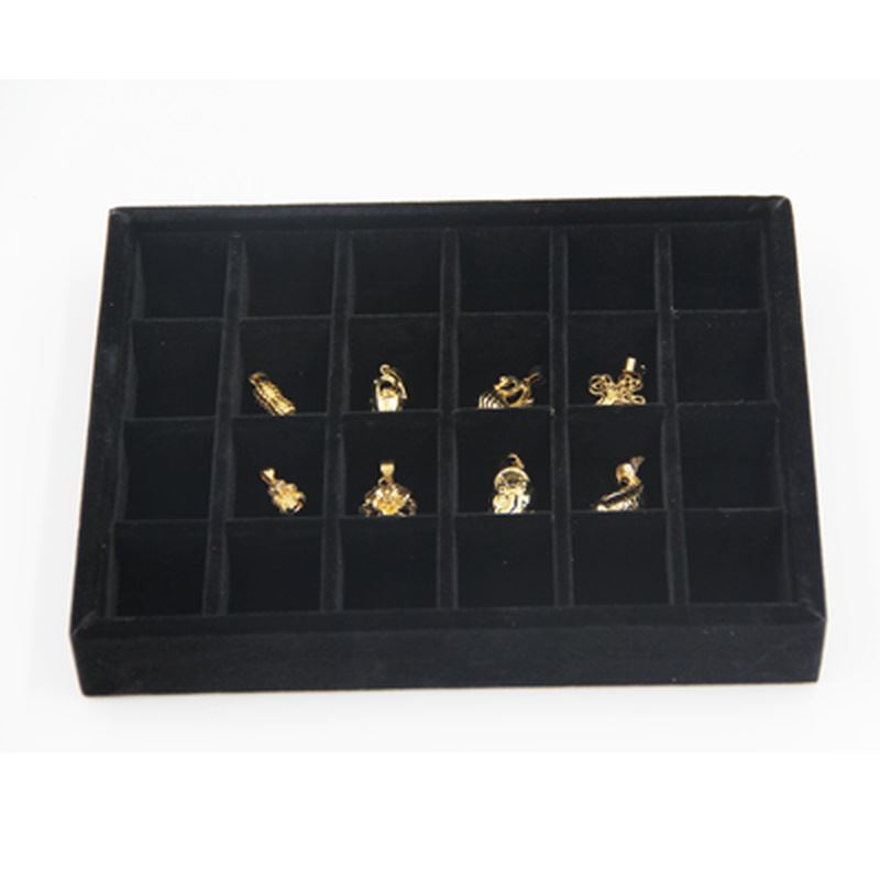 Gray velvet stackable jewelry organizer tray, ideal for displaying and storing accessories neatly.