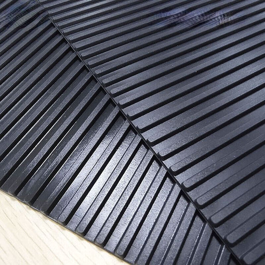 Heat-resistant, non-slip 30x21mm watch repair tool pad with adhesive back for secure workspace.