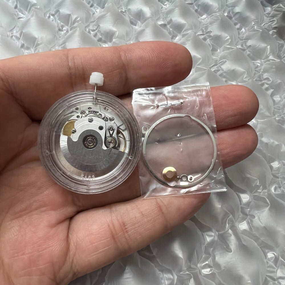 Silver Hangzhou HZ6460 GMT watch with 4 hands, automatic ETA 2836-2 movement for accurate timekeeping