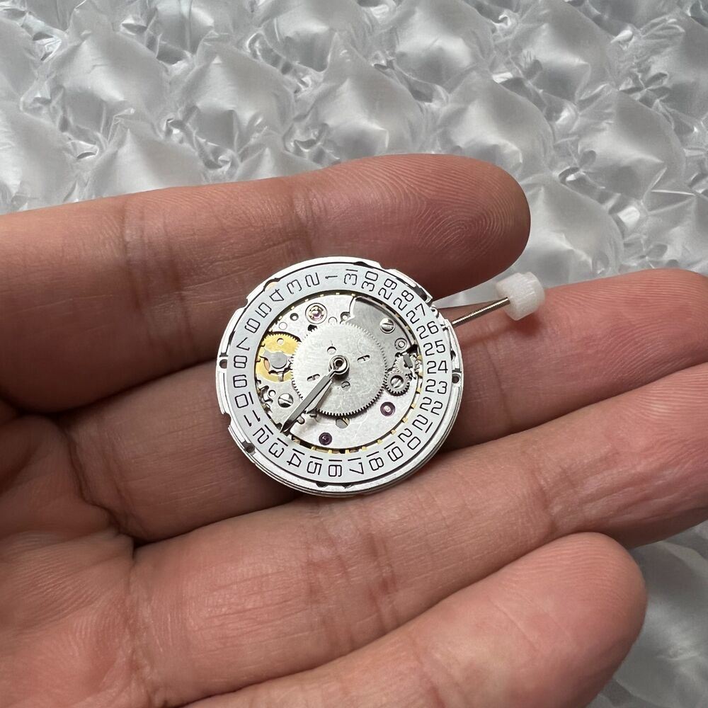 Silver Hangzhou HZ6460 watch with 4 hands, automatic ETA 2836-2 GMT movement by Hangzhou for precise timekeeping