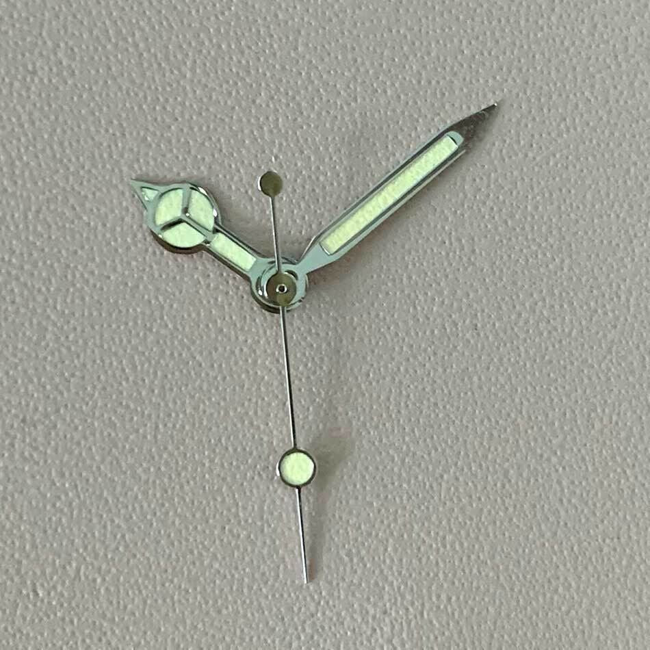 Green luminous orange watch hands set for NH35A/NH36A movement, enhancing visibility and style by Seiko.