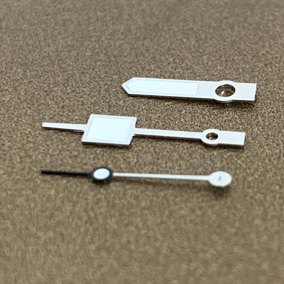 Green luminous watch hands set for NH35A/NH36A movement, boosting readability and sleek design.