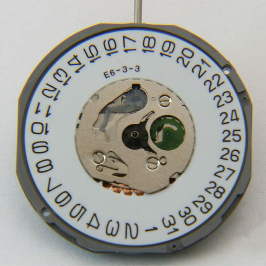 Miyota 1M12 Japan quartz watch movement with 3 hands and dual date display at 3 and 6 o'clock.