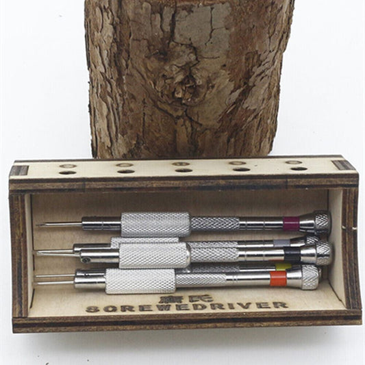 1. Five-piece steel screwdriver set with stand base for precise watch and jewelry repair.