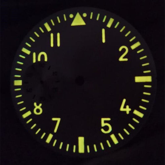 Silver 38.9mm pilot watch dial with orange luminous markers for ETA 6497 movement.