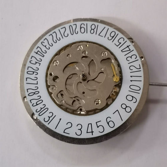 Silver automatic watch with mechanical movement, big date wheel, and small seconds at 3 o'clock.