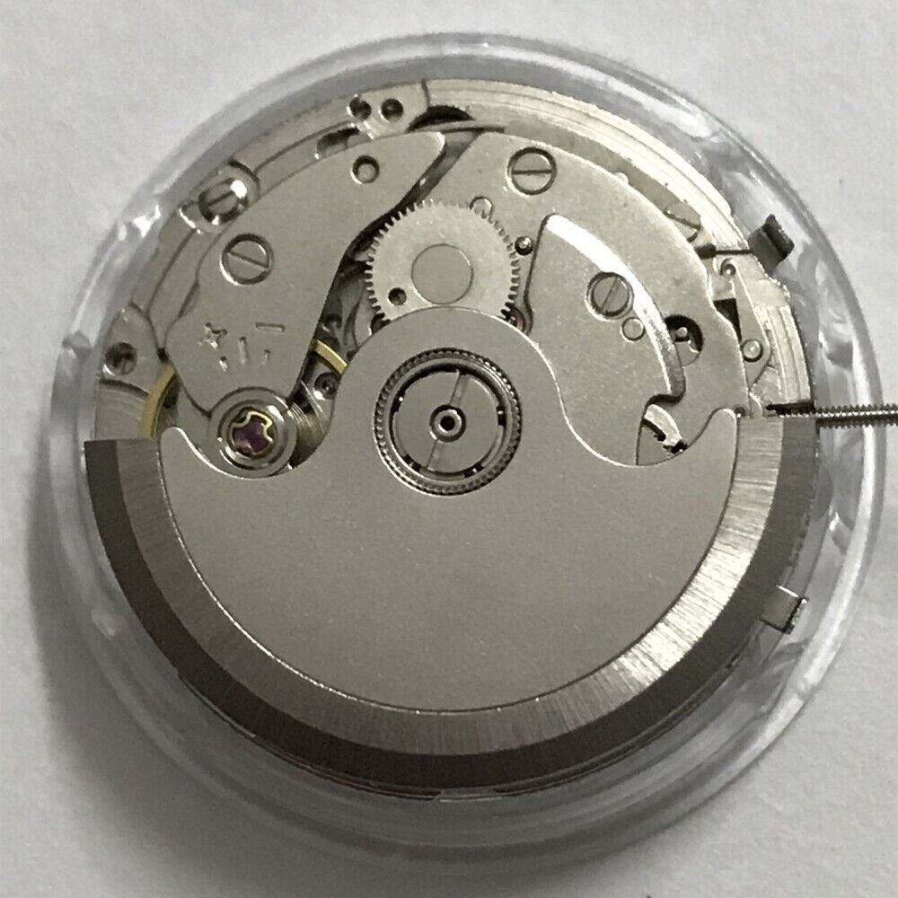 Shanghai JHB08 mechanical watch displaying classic design with small second subdial at 6, powered by China-made ST10 movement.