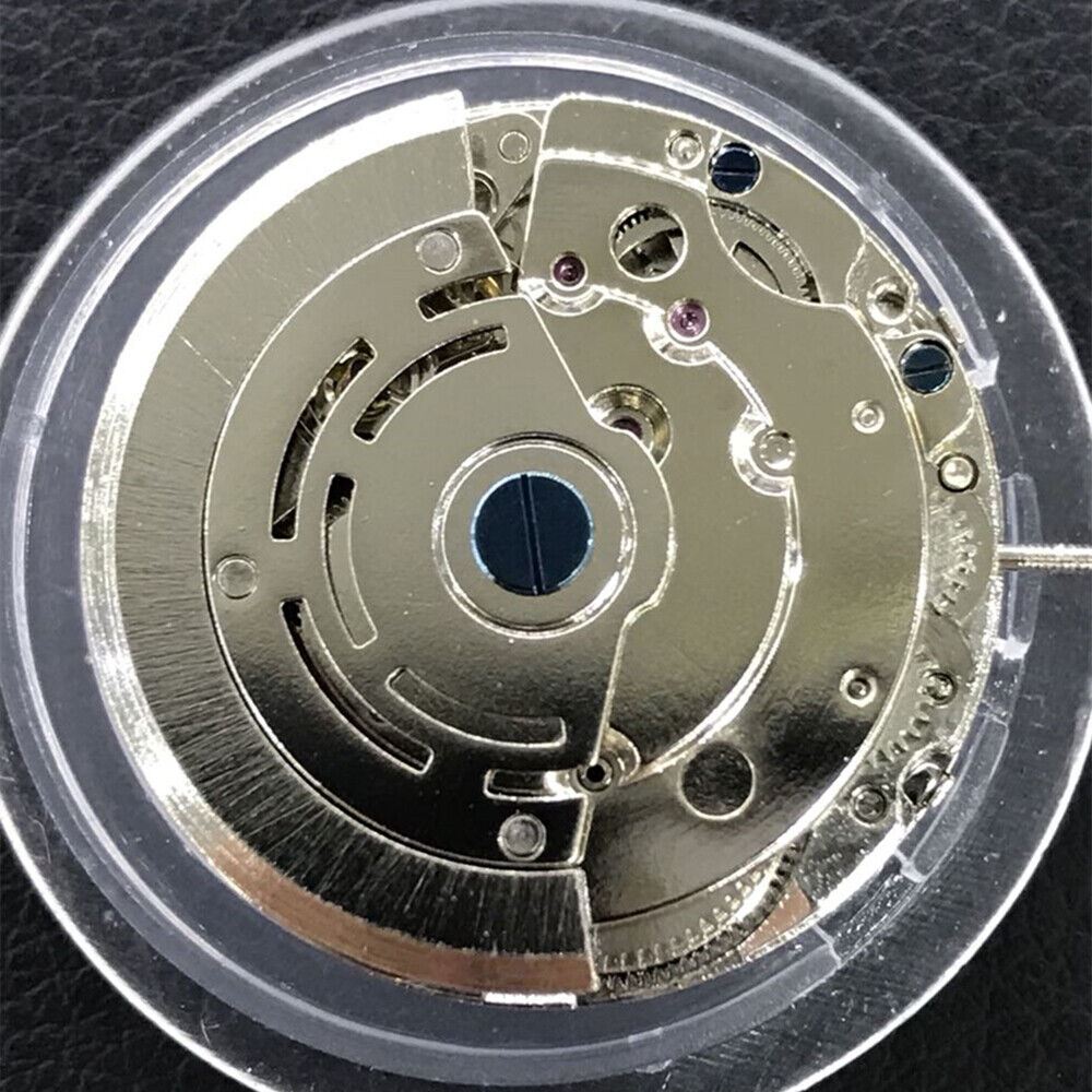 Nanning 2813 mechanical watch movement featuring moon phase at 6 o'clock and small seconds, China-made detail.