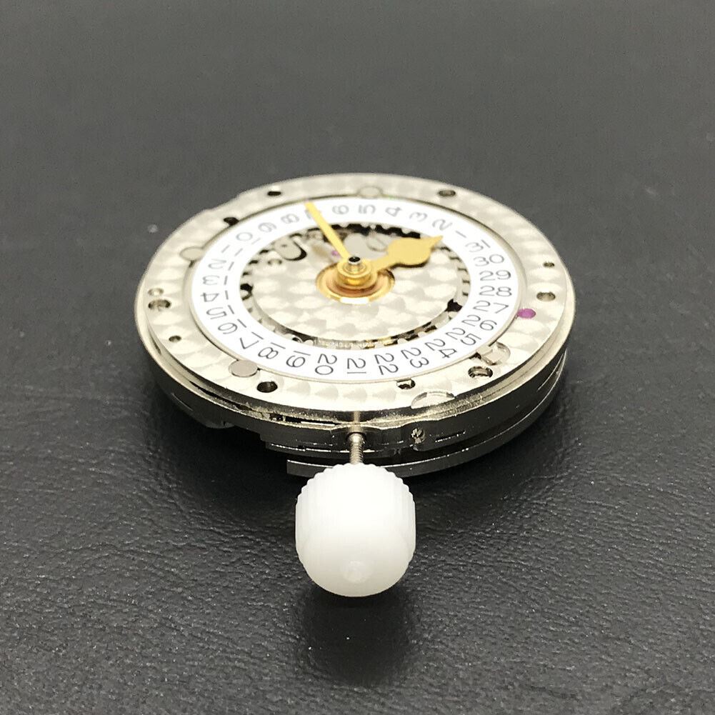 China Made 3186 Automatic GMT watch movement with engraved blue balance spring, precision engineering detail.