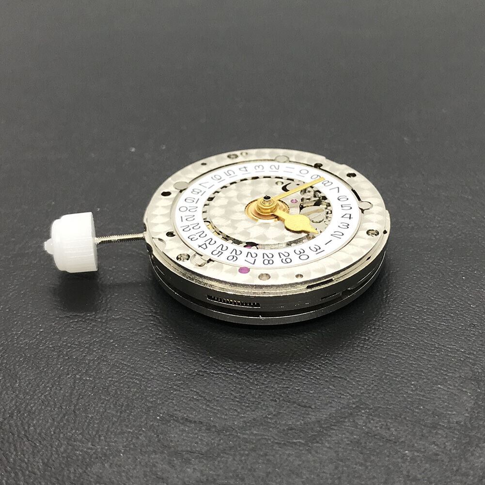 China Made 3186 Automatic GMT watch movement showcasing engraved blue balance spring and precision craftsmanship.
