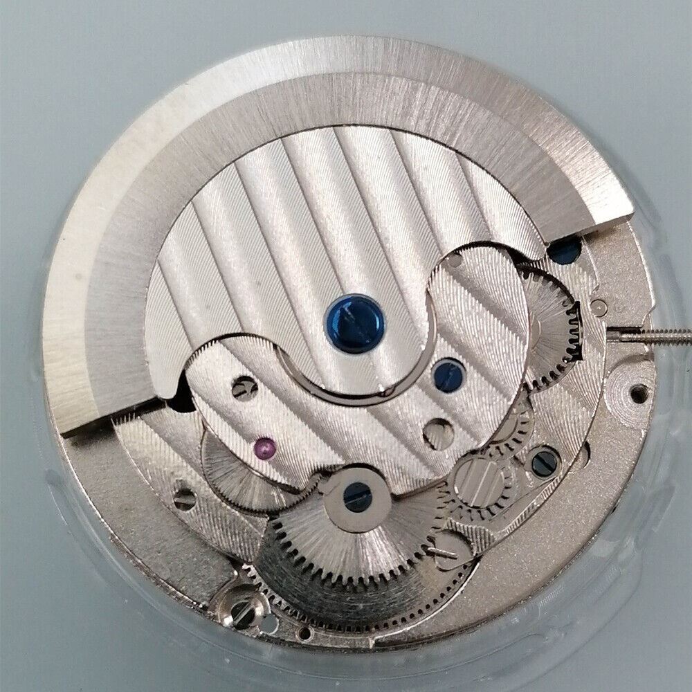 Shanghai LB20 watch accessory featuring mechanical movement, big date at 12, moon phase at 6, China made.