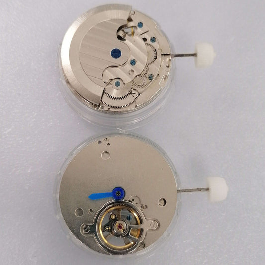 Shanghai brand silver flywheel watch showcasing mechanical movement with three hands for precise timekeeping.