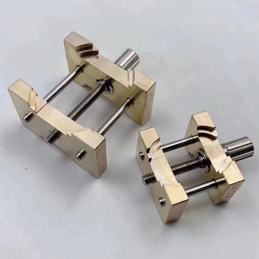 Copper extensible reversible movement holder clamp for watch repairs, compatible with 4040 and 4039 models.