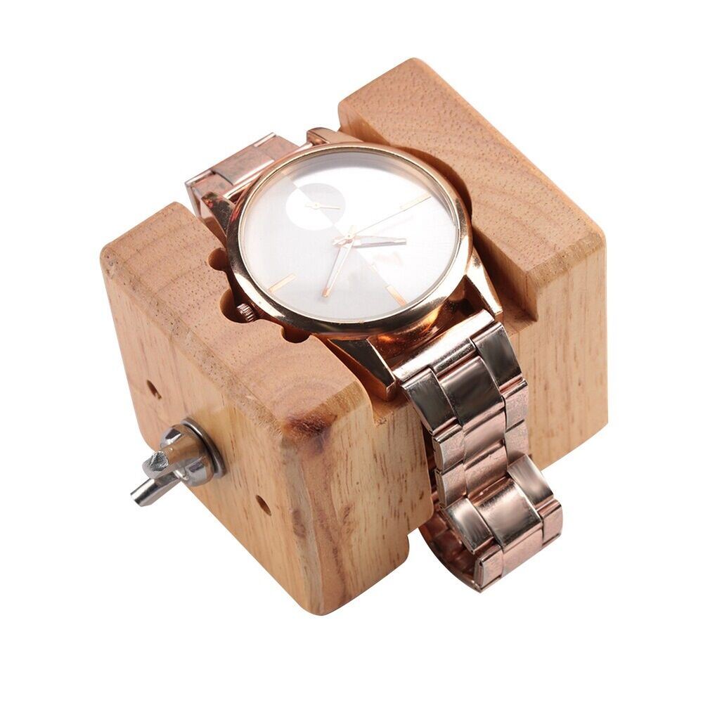 Wooden watch case holder block, designed for stable and precise watch repair work.