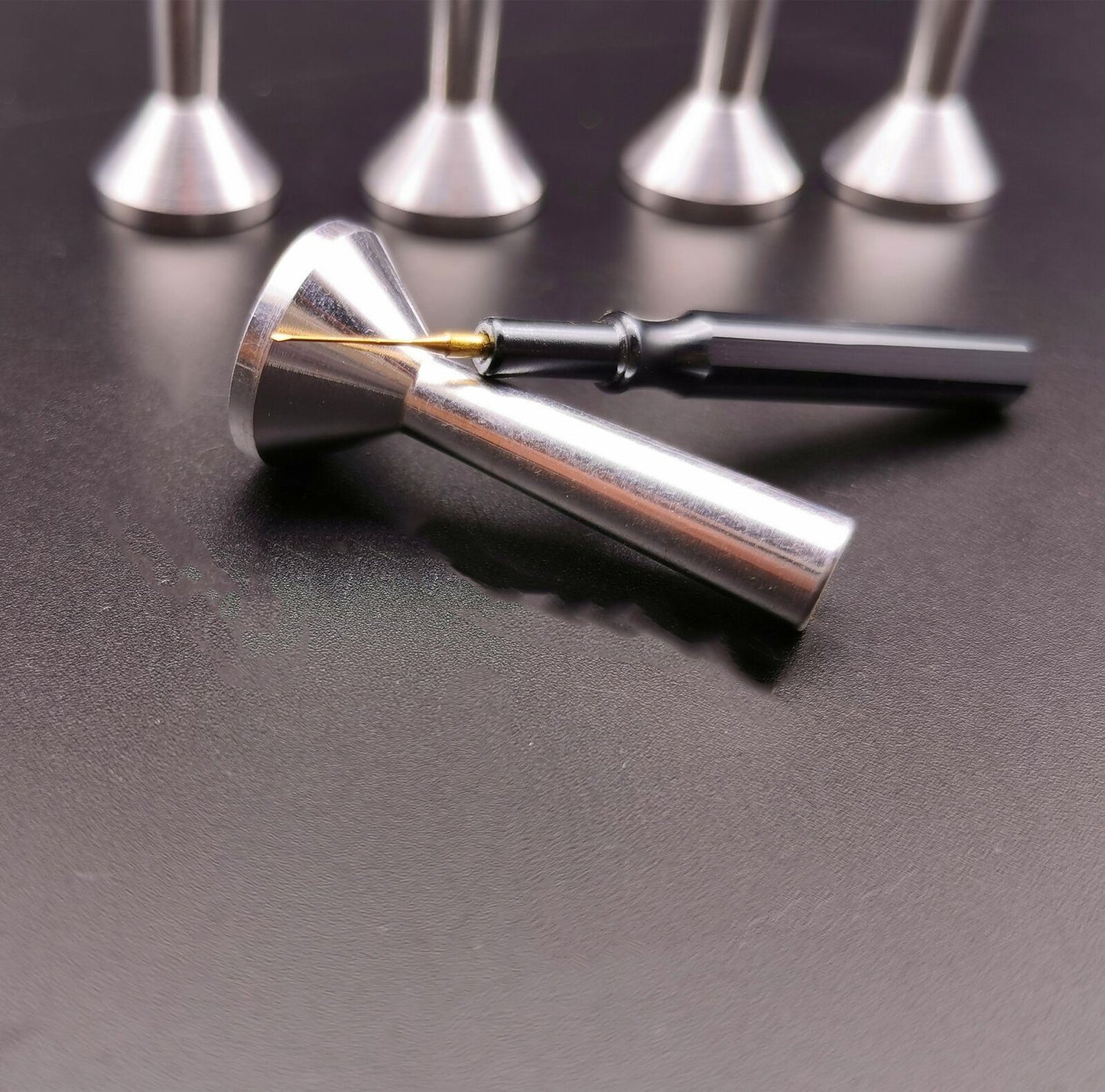 Watchamkers set of 5 metal lubricants for precision watch oiling, improving performance and durability.
