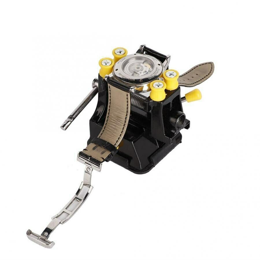 Adjustable back case holder for secure and accurate watch repair tasks.