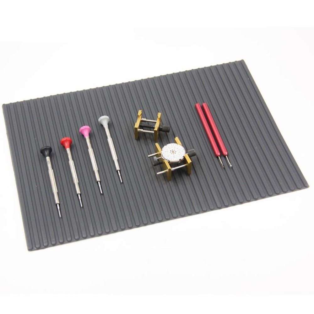 Heat-resistant non-slip pad mat 30mm x 21mm for watch repair, with adhesive back for secure placement.