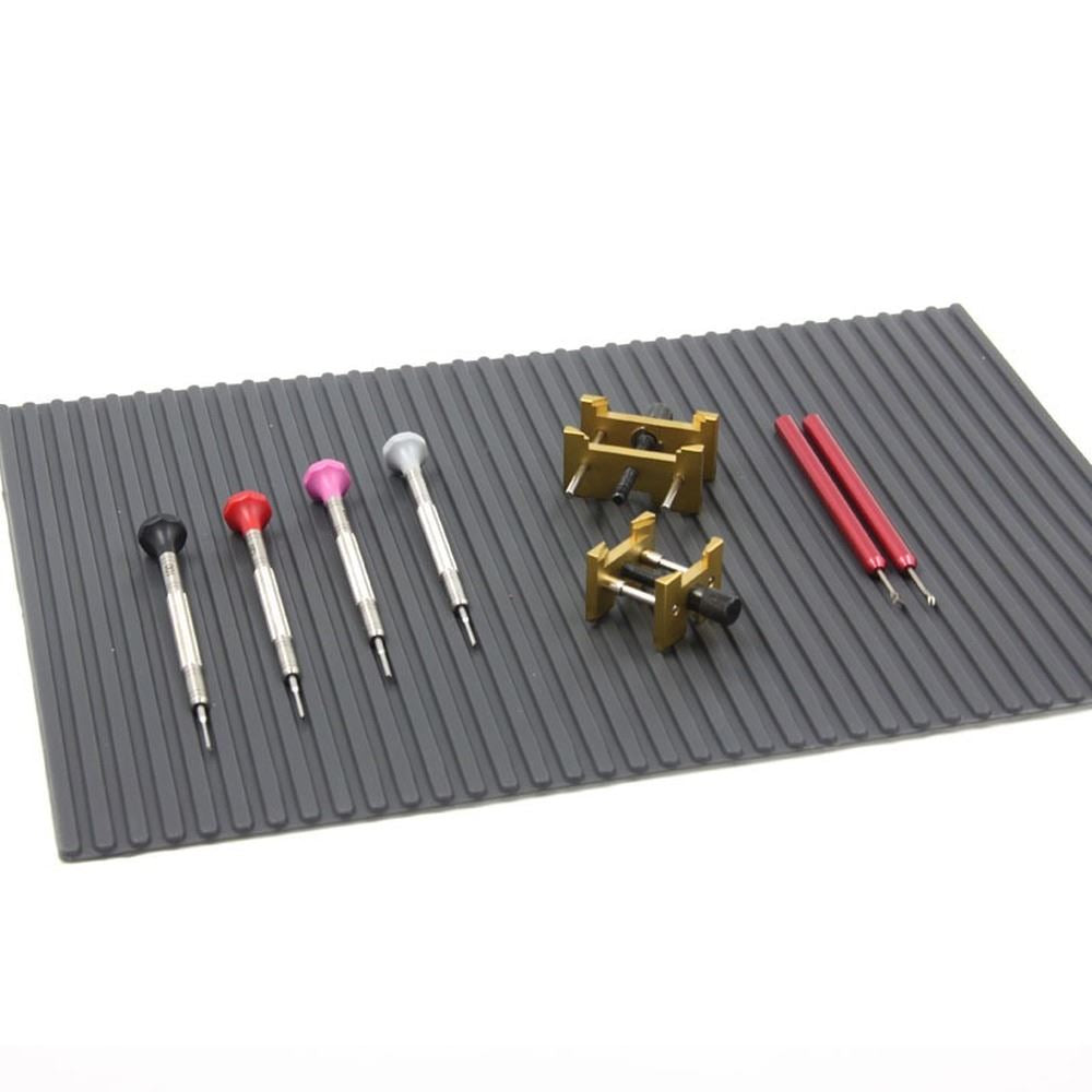 Heat-resistant non-slip pad mat 30x21mm with adhesive backing for secure watch repair placement