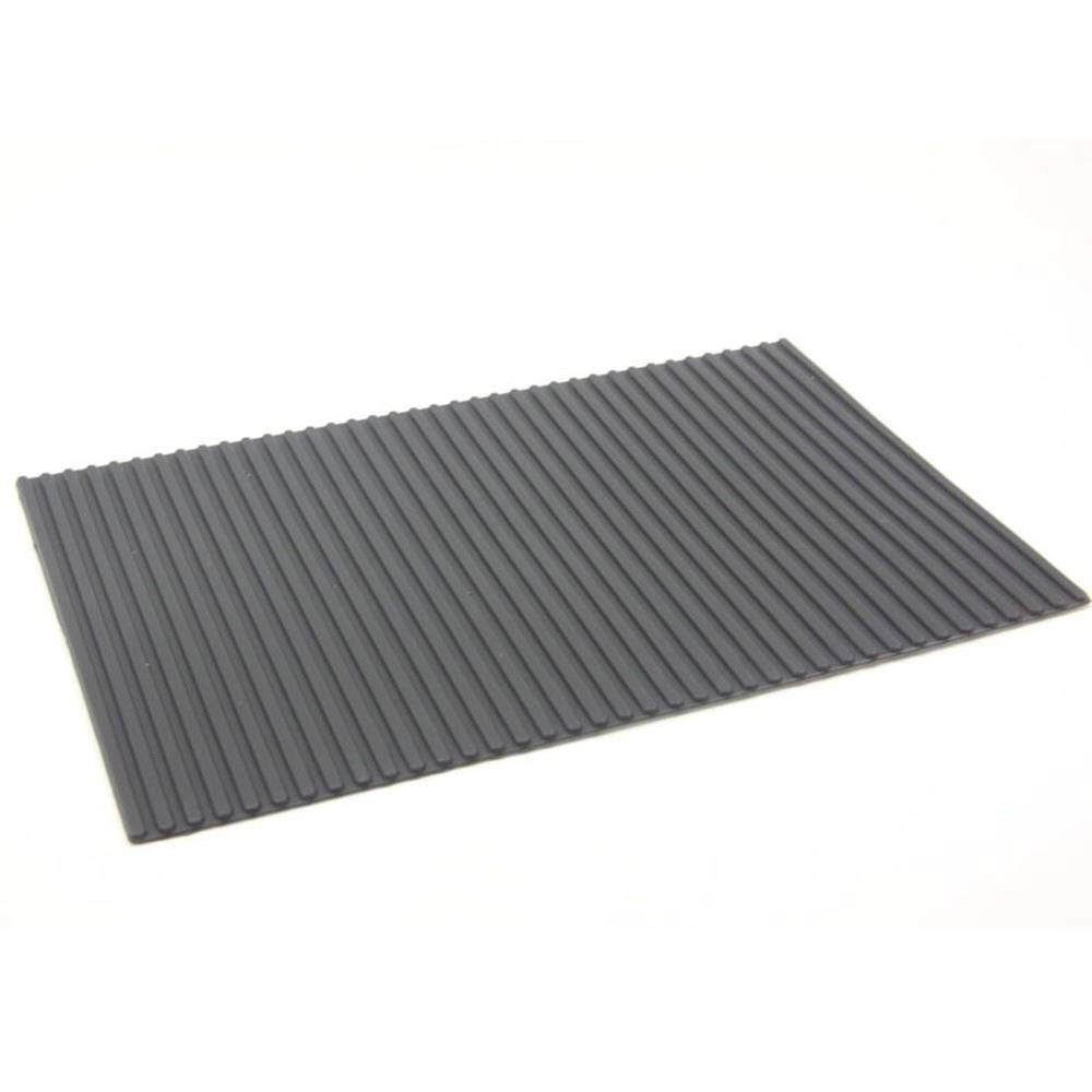 Heat-resistant non-slip pad mat 30x21mm with adhesive backing for secure watch repair use.