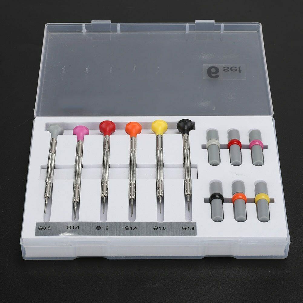 Set of 6 precision screwdrivers with 12 spare heads for mobile phone and laptop repairs, branded for quality.