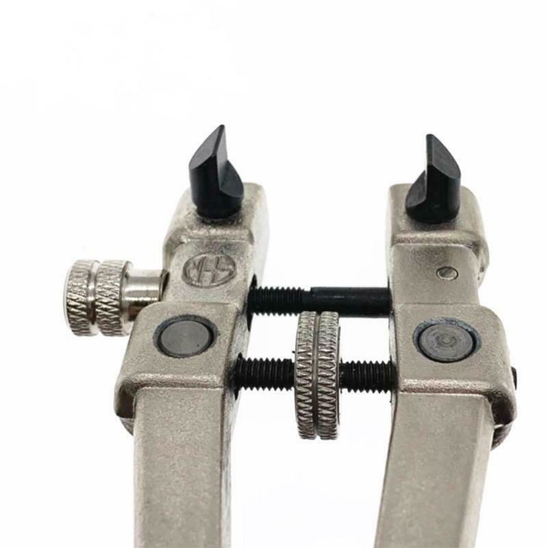Watchmaker adjustable wrench for opening screw back watch cases, precision repair tool by Watchmaker.