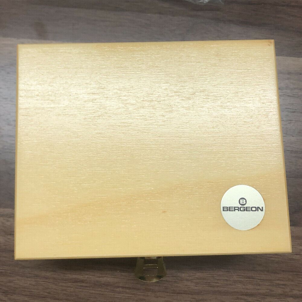 Bergeon 5355 Swiss mainspring winder set in wooden box for precise watch repair tasks.