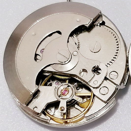 26.5mm 7120 automatic mechanical watch movement with single calendar and 3 hands for precision timekeeping.