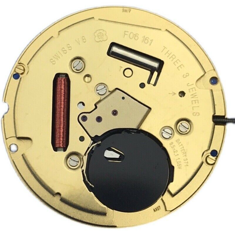 ETA F06.161 quartz watch movement showing white dial, 3 hands, date display at 3 o'clock, Swiss precision.