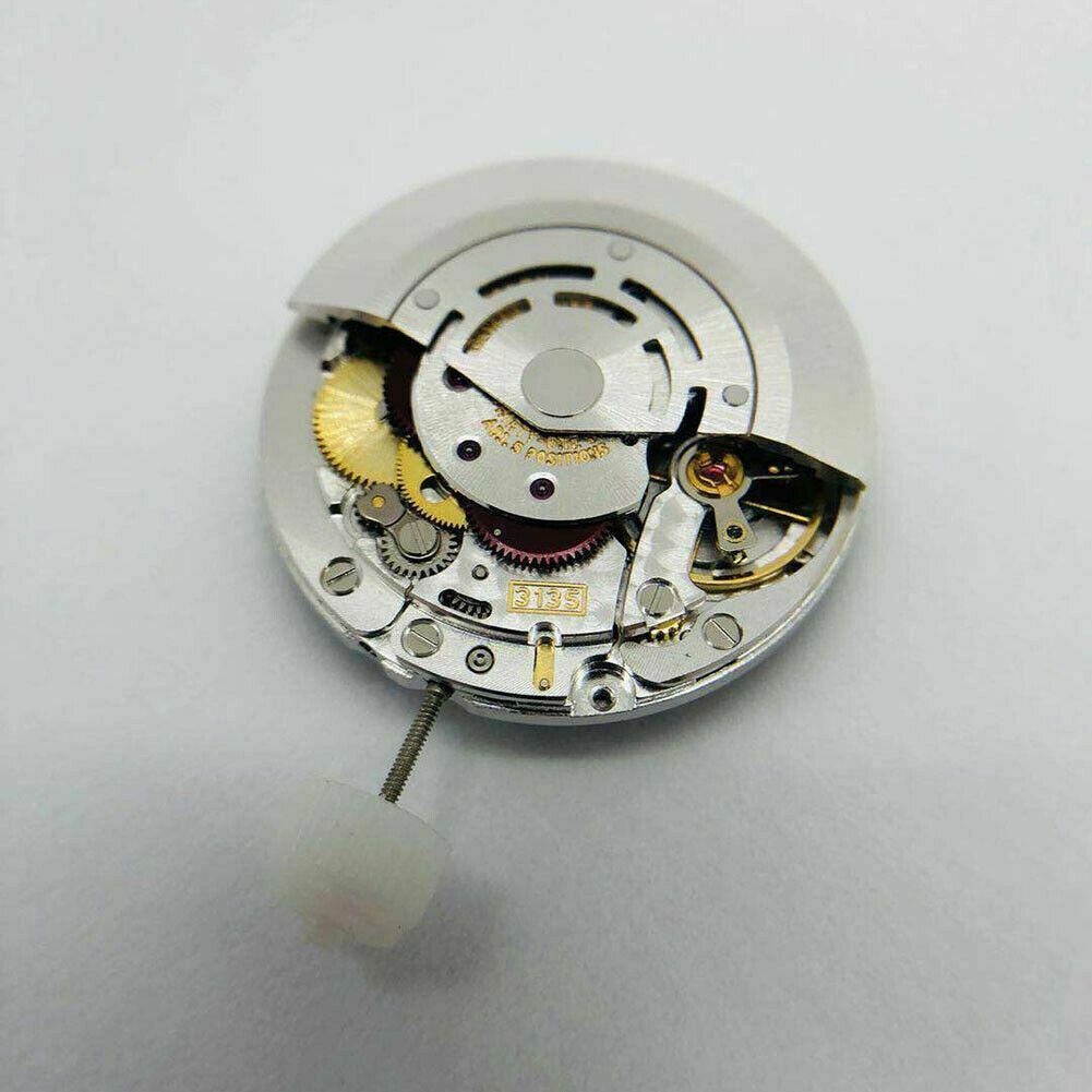 SH3135 watch movement with detailed engraving and blue balance spring, highlighting Seiko?s precision engineering.