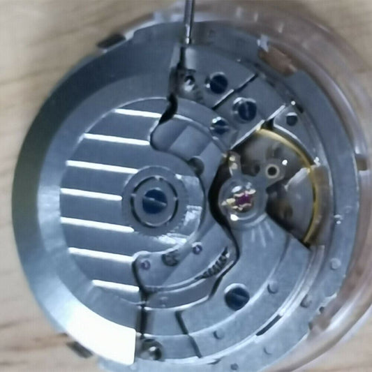 China Made mechanical automatic watch with 3 hands, big date at 12, multi-function dial, precision movement.