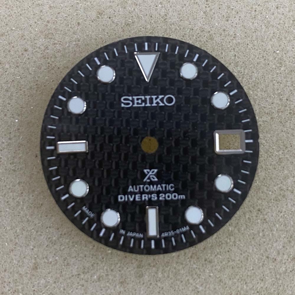 29mm green luminous carbon fibre watch dial by NH35, ideal for custom mechanical watch builds.
