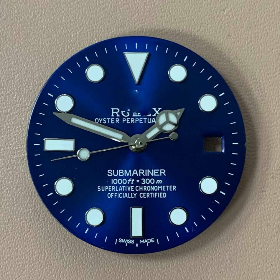 Blue-green luminous RLX watch dial with hands, compatible with 8215/2813/8200 movements for accurate timekeeping.