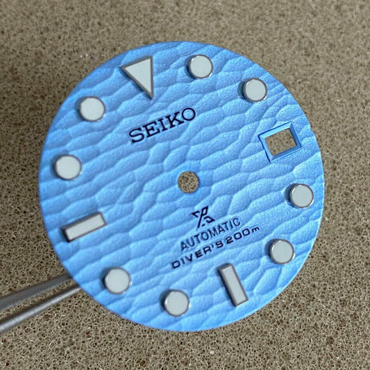 VE45 28.5mm green luminous watch dial designed for NH35 movement with clear hour markers.