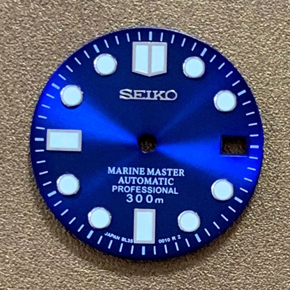 Green luminous 28.5mm Big Nail dial by AE17 for NH35 custom watch builds, vibrant glow and precise fit.