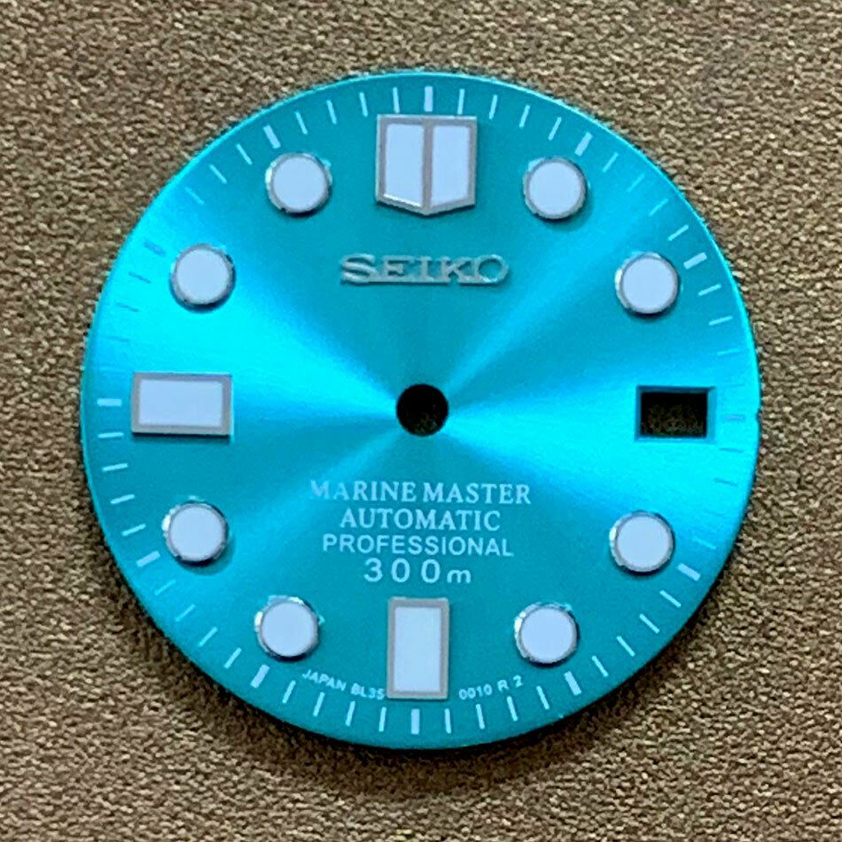 Green luminous 28.5mm Big Nail watch dial by AE17 for NH35 movement, ideal custom watch component.