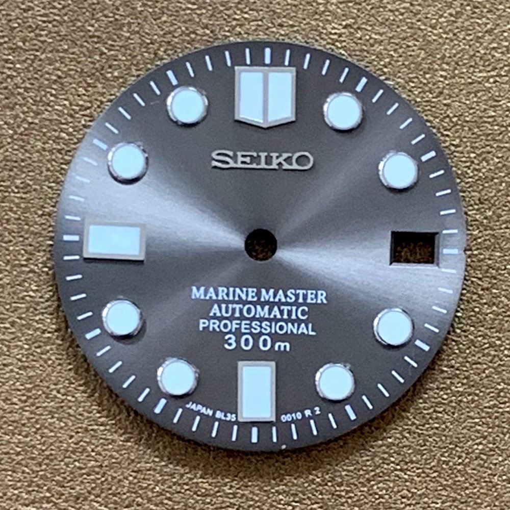 Green luminous 28.5mm Big Nail watch dial for NH35 movement by AE17, perfect for custom watch builds.