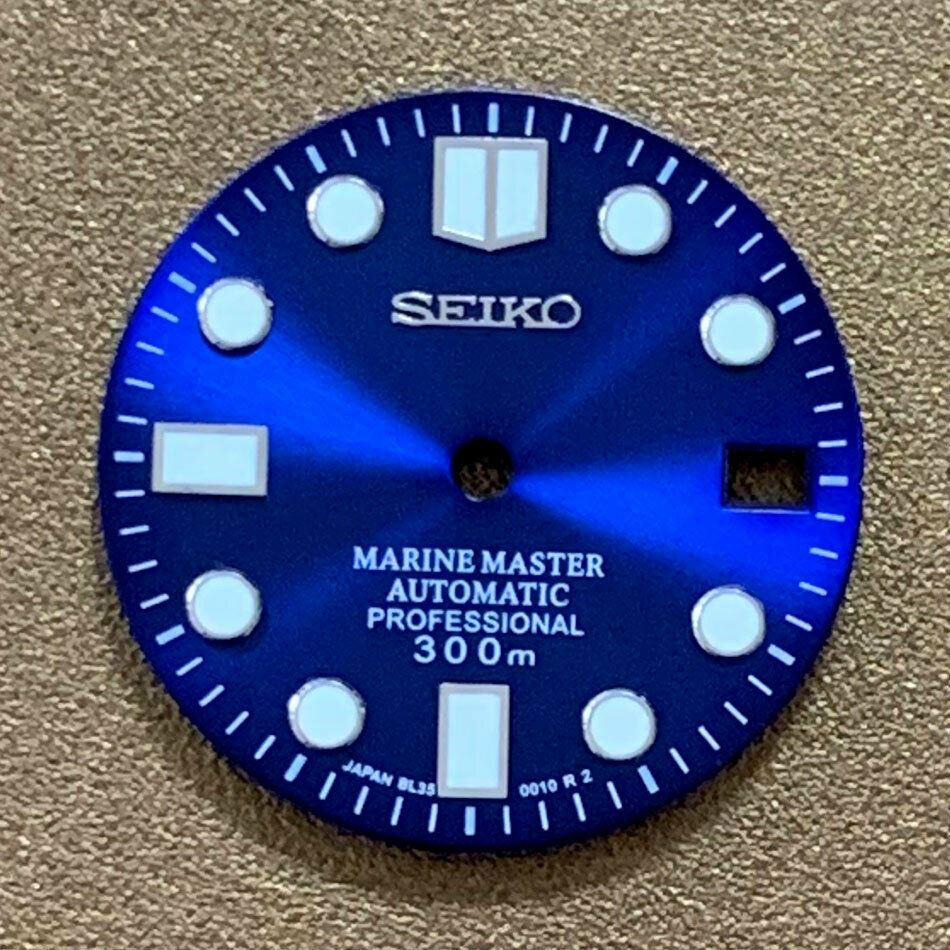 Green luminous 28.5mm Big Nail watch dial for NH35 movement by AE17, perfect for custom watch builds.
