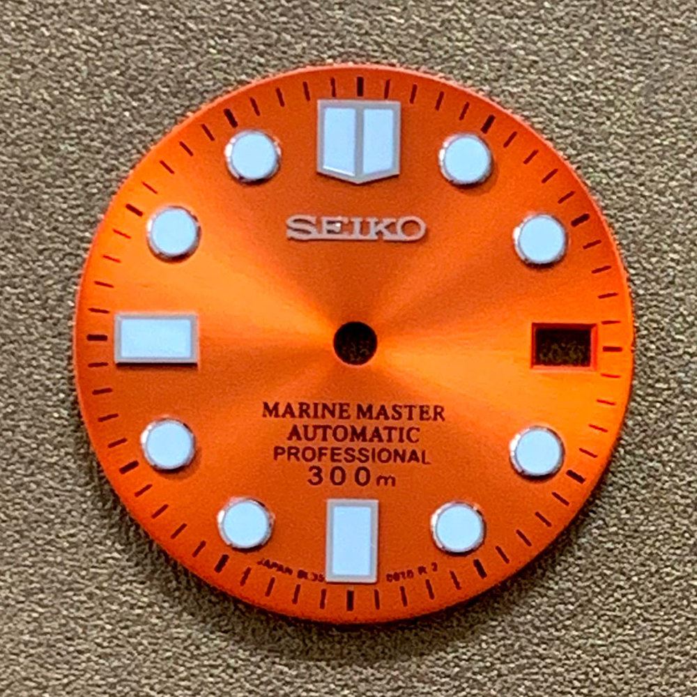 Green luminous 28.5mm Big Nail watch dial for NH35 movement by AE17, perfect for custom watch builds.