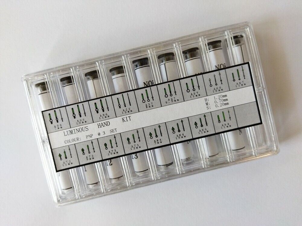 Set of 51 luminous silver watch hands in varying sizes, ideal for precise timepiece repairs, brand AC632W.