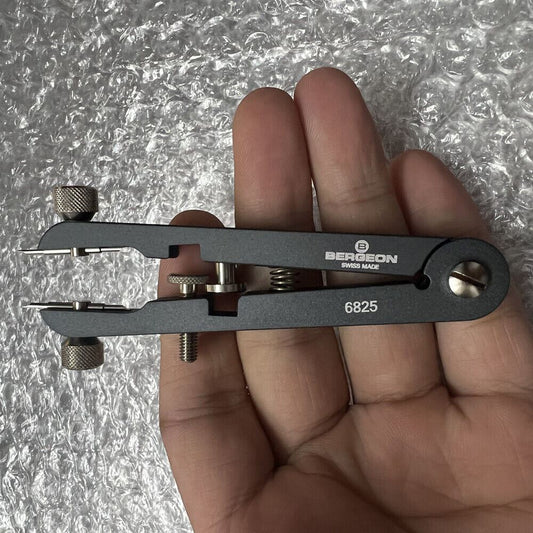 Swiss Black Bergeon 6825-PF spring bar pliers for precise watch bracelet removal and strap adjustment.
