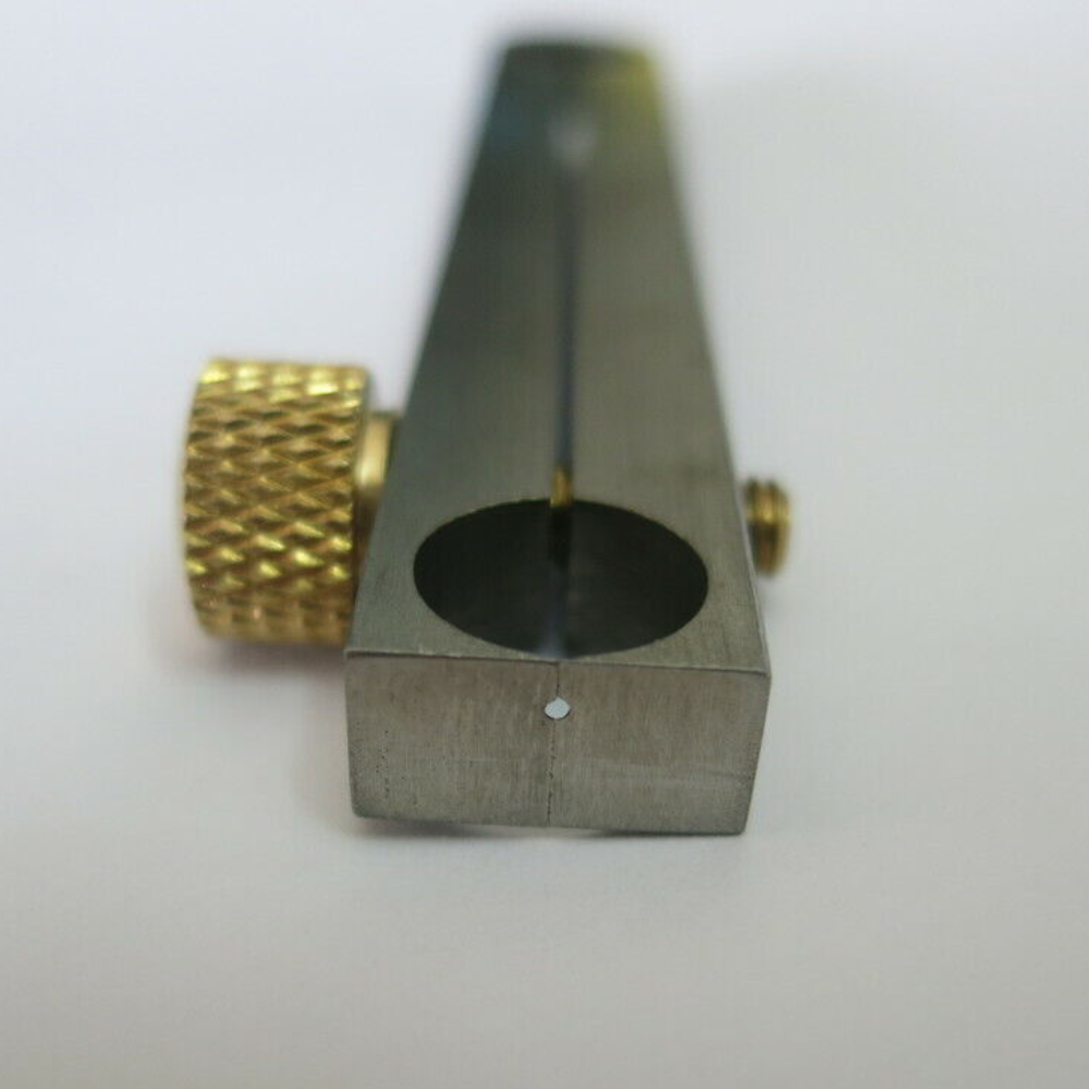 Centre wheel clamp tool designed for accurate watch movement repairs and assembly tasks.