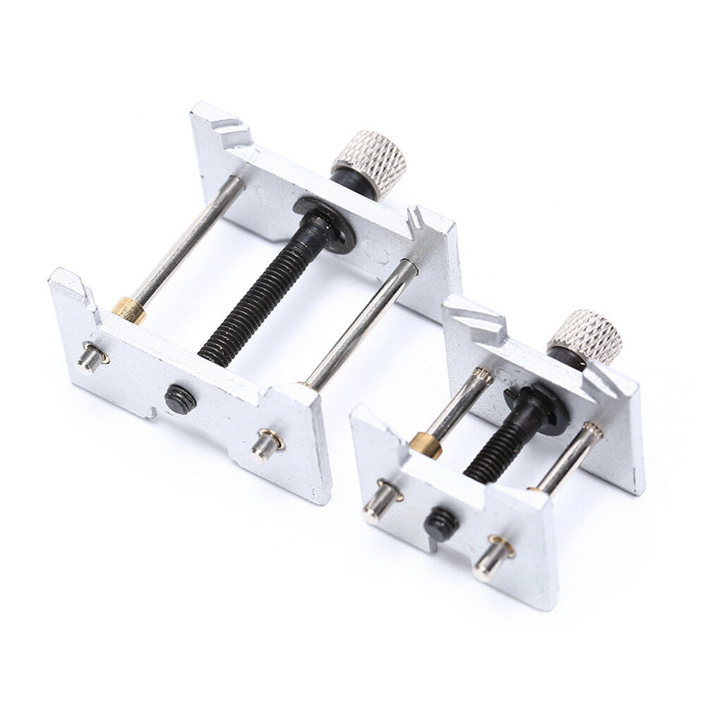 Precision metal watch movement holder clamp, ideal for secure watch repairs and adjustments.